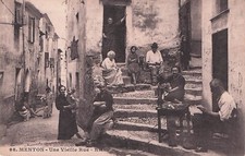 Old postcard postcard MENTON old street shoemaker