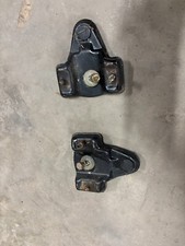 Pre-owned OEM handle brackets  from a Kubota W5019 push mower.