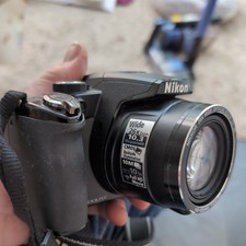 Nikon Coolpix P100 10.3MP Digital Bridge Camera. 26x Optical Zoom, Full HD