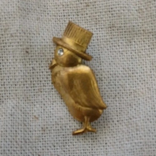 Broche oiseau doré métal