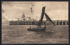 Old postcard Calais, fishing boat entering the port 