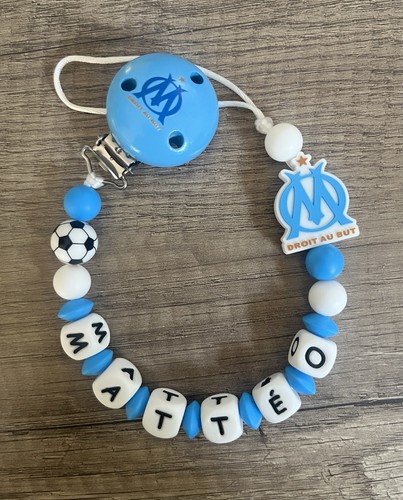 Attache tétine olympique - tétine, om