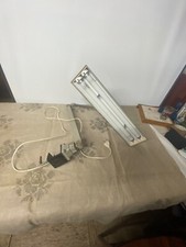 Industrial lamp that works attaches to table or other in its juice