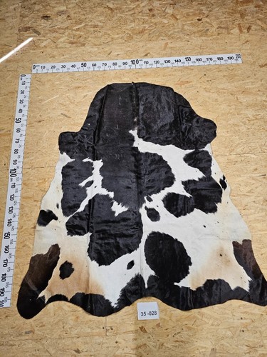 Peau vache avec petits - de,