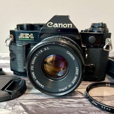 Canon AE-1 Program SLR 35mm Film Camera Black w/ Canon Lens FD 50mm F1.8 s.c.