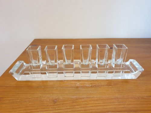 Service vodka glasses on - 6,