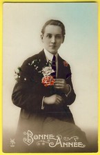 Old postcard fantasy happy year young man tie bouquet roses and GUI 