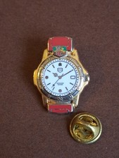 Pin's Arthus Bertrand Montre 