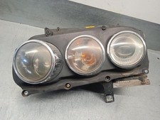 60683988 phare gauche pour