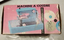 machine à coudre en boîte  "