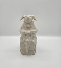 Ancienne tirelire à casser. Cochon humanisé.