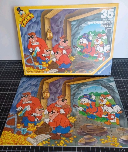 Puzzle ravensburger - 🦆💰,