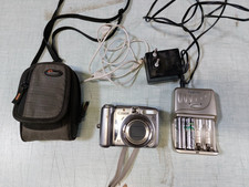 APN compact Canon PowerShot A720 is 8MP Argent