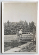 Girl sitting barrier wood country white dress - old photo snapshot