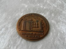 Ancienne médaille en bronze