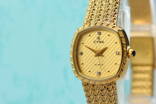 Montre femme cyma gold - montre,