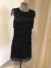 Superbe robe noir franges cuir