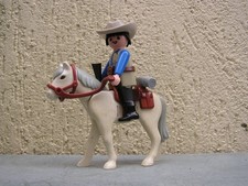 PLAYMOBIL westerns : sheriff à cheval avec selle porte fusil et couverture