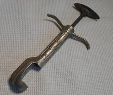 ANCIEN  PISTOLET DENOYAUTEUR