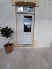 Grande porte d’entrée avec vitrail art deco