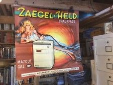 Affiche OKLEY : PIN UP POELE A MAZOUT pour « ZAEGEL-HELD Chauffage" / 58 x 58cm