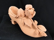 TRES JOLIE CHAUSSURE MURALE