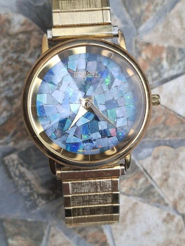 Montre quartz vintage - à,