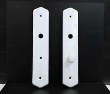 Pair of porcelain cleanliness plates with condemnation button, bathroom door, toilet