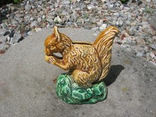 ancienne tirelire en faience a