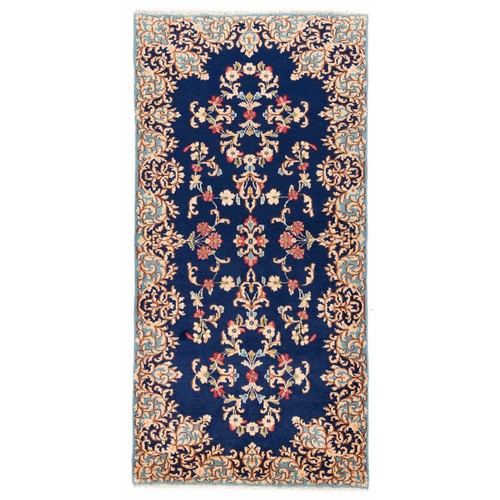 Tapis oriental noué - , à