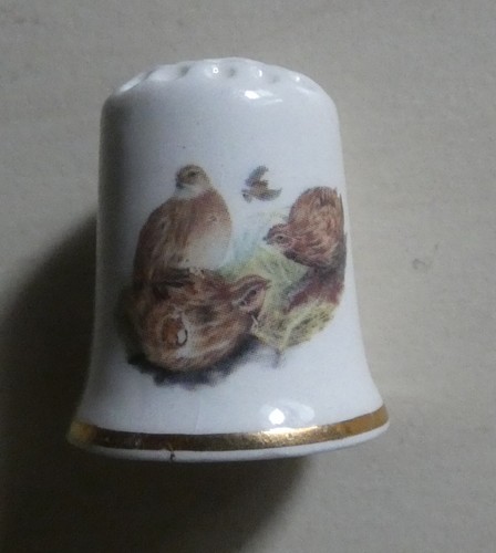Dé coudre porcelaine - à,