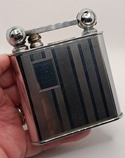 Briquet a essence de table