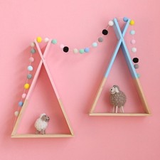 Bébé en bois monté sur