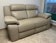 Canapé 2 places en cuir beige avec 2 relax électrique Poltronesofà