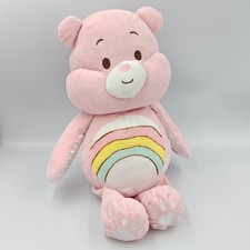Doudou ours rose soleil