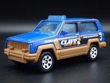 1984- 2001 Jeep Cherokee Aventure Tours W/Attelage 1:64 Miniature Voiture