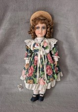 Poupée en porcelaine 55 cm