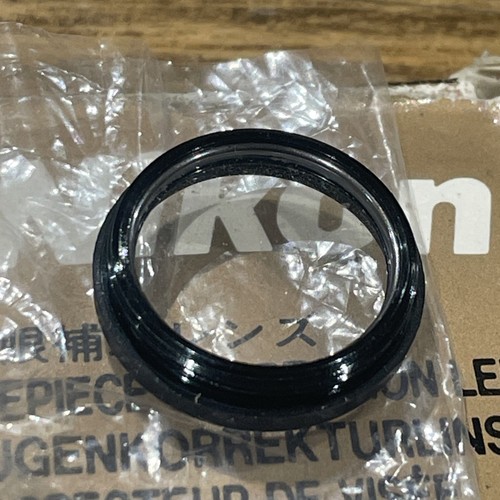 Eyepiece correction lens - , nikon