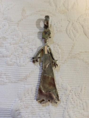 Pendentif personnage argenté