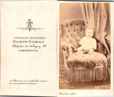 Vintage C Curtain, Cherbourg, Baby, Toddler Sitting on a Velvet Chair C