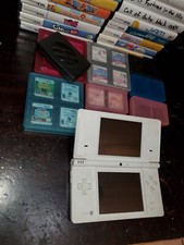 Nintendo DS LITES WITH 45 games. 8 game holders. 18 game cases. 2 game bags