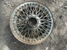 ancienne jante a rayon triomphe oil pompe  essence garage déco bidon voiture 