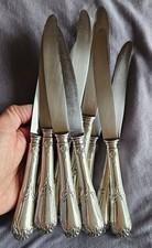 SFAM  12 couteaux de table  Métal argenté & lames inox  Style Louis XV feuillagé