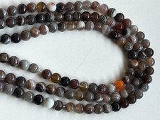 Fil de 47 perles d'Agate de