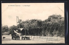 Old postcard Le Croisic, Le Mont-Esprit and a trailer near a wooden fence 