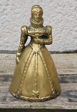  PETITE CLOCHE DE TABLE FEMME