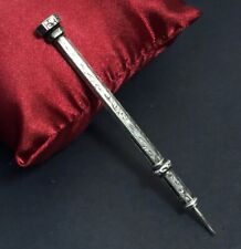 Antique 19th Century Chiseled Silver Mine Holder Pen Adorned with an Amethyst Gem »