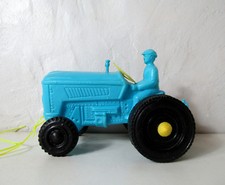 jouet ancien tracteur bleu en