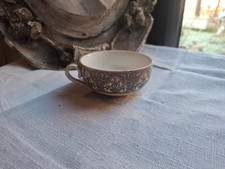 Ancienne tasse à café Terre
