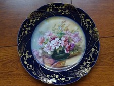 POUYAT LIMOGES FLAT PLATE 19th century PORCELAIN GILDING AND BLUE OVEN FLOWERS